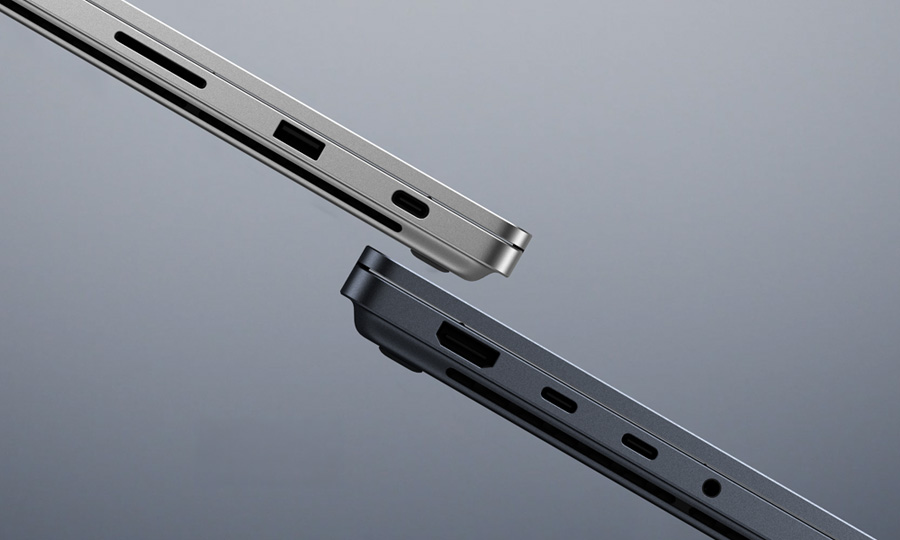Both sides of Surface Laptop Ultra in silver and black, showing the SD slot, USB-A, USB-C, HDMI and headphone jack